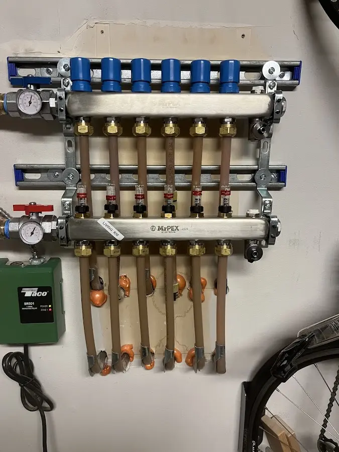 Plumber performing Water Heater Repair at a residential property in Magnolia